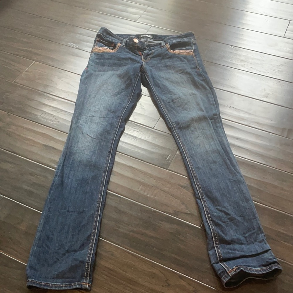 Express ankle Jean, Stella, low rise Jean. Gold embellishments. Size 2